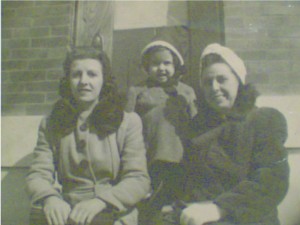 Barbara Baynes (middle) with her family on the steps at 643 South Kenwood Avenue.
