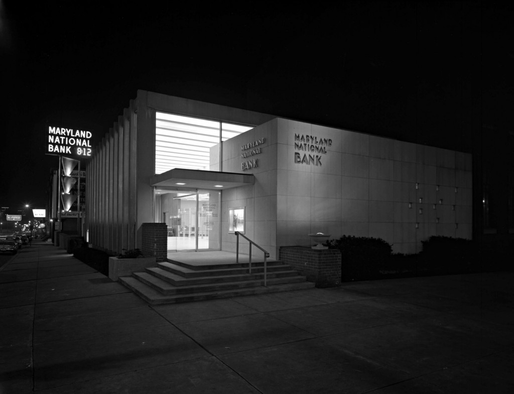 Photograph of the Maryland National Bank at night, 1965 March 2. Courtesy Baltimore Museum of Industry, BG&E Collection, BGE.40728.