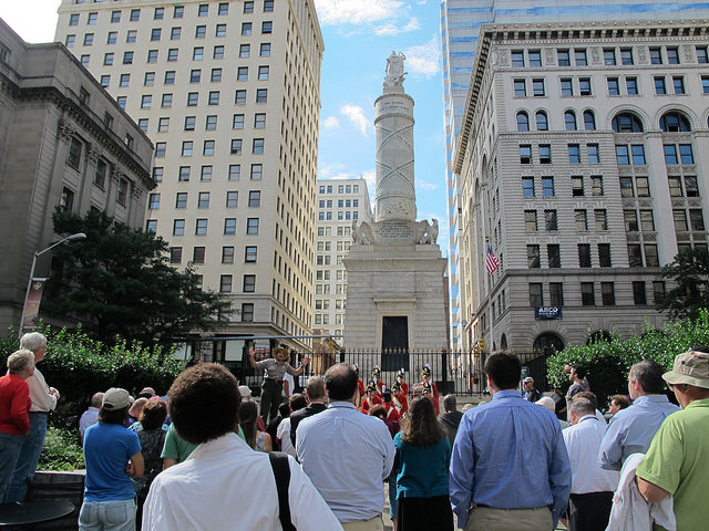A crowd gathers at the Battle Monument as part of the Star-Spangled Spectacular, the bicentennial commemoration of the defense of Baltimore, in 2014. 